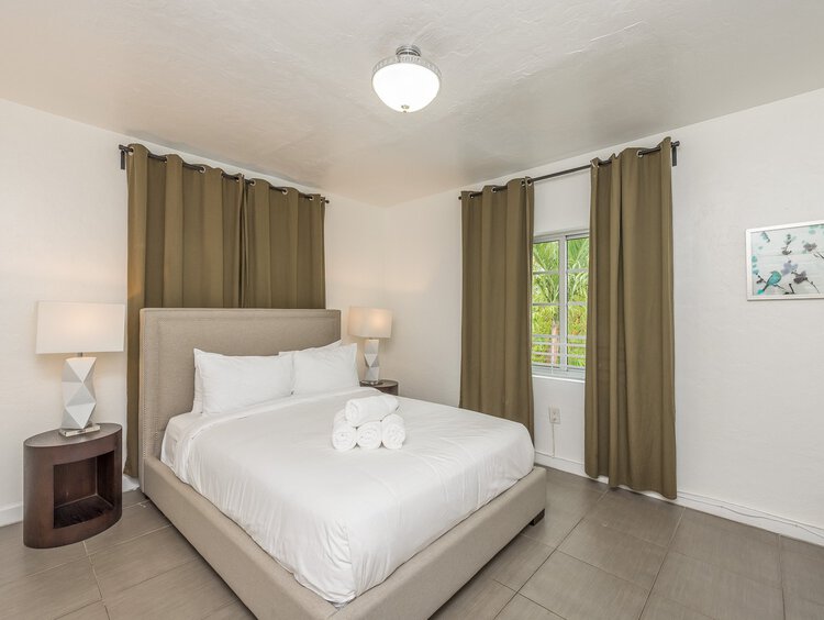 Queen bed in room